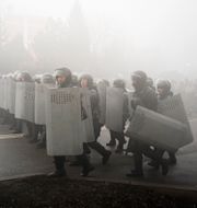 Kravallpolis under protesterna. Vladimir Tretyakov / AP