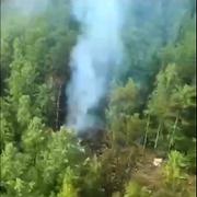 Rök från det kraschade flygplanet. 