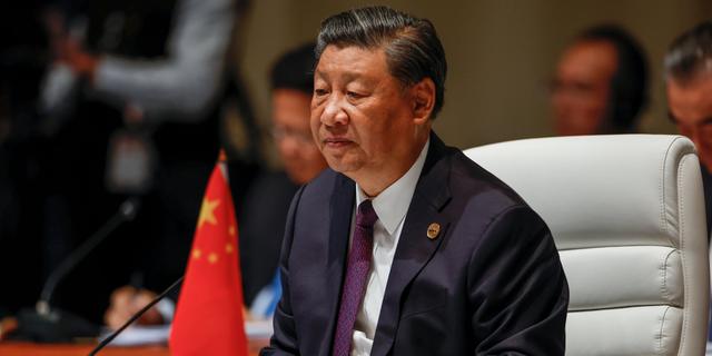 Xi Jinping Gianluigi Guercia / AP