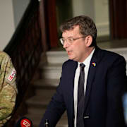 Troels Lund Poulsen och danska försvarstoppen Michael Wiggers Hyldgaard.