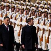 Kinas president Xi Jinping och Frankrikes dito Emmanuel Macron. Ng Han Guan / AP