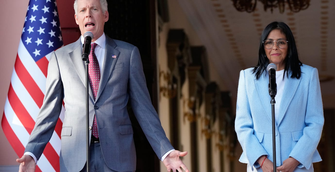 Chris Wright och Delcy Rodríguez. 