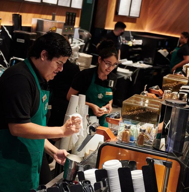 A new barista, left, training at a Starbucks in the MGM Grand in Las Vegas this week. BRIDGET BENNETT FOR THE WALL STREET JOURNAL