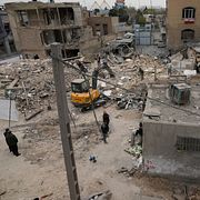 Skadade byggnader i Teheran efter en tidigare attack.