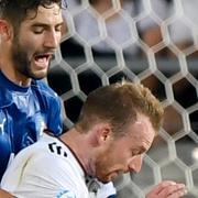 Italien och Tyskland bråkar om bollen efter Italiens 1–0-mål.