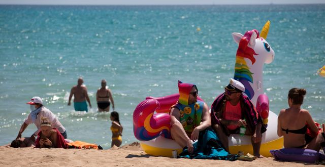 Arkivbild. Turister på en strand på Mallorca.  Francisco Ubilla / TT NYHETSBYRÅN