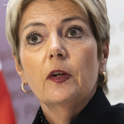 Trump och förbundspresident Karin Keller-Sutter. Arkivbilder.
