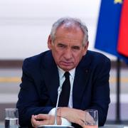 Francois Bayrou (till vänster) och Emmanuel Macron (till höger).