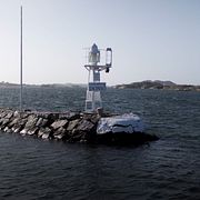 Arkivbild av Donsö i Göteborgs skärgård. Fartyget ligger ankrat i närheten.