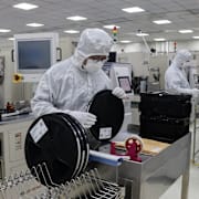 Kinesisk chipfabrik. Illustrationsbild.