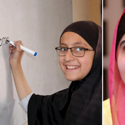 En flicka i Swat skriver ”Välkommen Malala” på vita tavlan. 