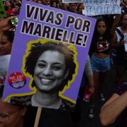 En affisch med Marielle Franco under en demonstration på Internationella kvinnodagen förra veckan. 