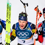 260215 Bronze medalist Emilien Jacquelin of France, gold medalist Martin Ponsiluoma of Sweden and silver medalist Sturla Holm Lægreid of Norway celebrate in men's biathlon 12,5 km pursuit during day 9 of the 2026 Winter Olympics on February 15, 2026 in Anterselva. Photo: Jon Olav Nesvold / BILDBYRÅN / COP 217 / MB1329