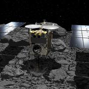 Illustration av Hayabusa-2 och asteroiden Ryugu.