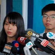 Aktivisterna Agnes Chow och Joshua Wong. 