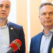 Fredrik Reinfeldt och Jan Björklund i Kungsträdgården.