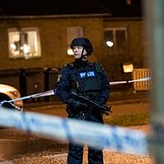 Polis på plats i området där skjutningen inträffade. 