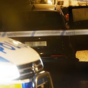 Polis på plats efter att en person har skjutits i södra Stockholm på fredagseftermiddagen.