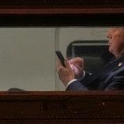 Trump med telefon. Arkivbild.
