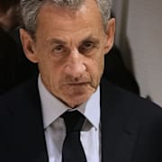Nicolas Sarkozy dömdes till fem års fängelse för olovligt kampanjstöd. Han har överklagat domen.