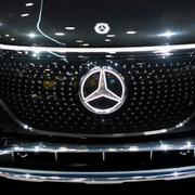 People view the Mercedes-Benz EQE 4MATIC SUV during the CES tech show Friday, Jan. 6, 2023, in Las Vegas. (AP Photo/John Locher)  NVJL120