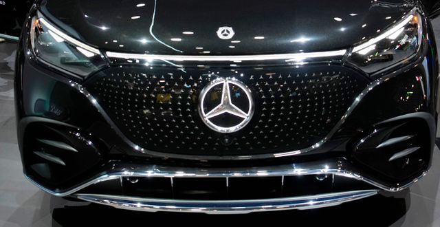 People view the Mercedes-Benz EQE 4MATIC SUV during the CES tech show Friday, Jan. 6, 2023, in Las Vegas. (AP Photo/John Locher)  NVJL120 John Locher / AP
