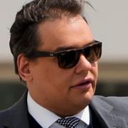 George Santos i samband med rättegången.