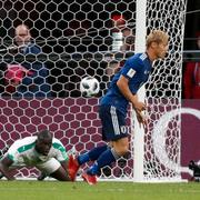  Keisuke Honda gjorde Japans 2–2-mål.