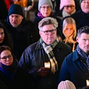 Gunnar Strömmer och andra ministrar under ljusmanifestation i Stockholm, 4 januari. 
