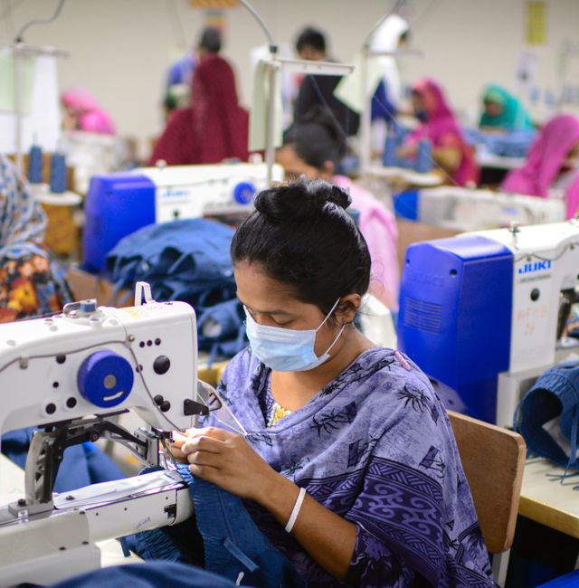Garment employees work at Arrival Fashion Limited in Gazipur, Bangladesh, Saturday, March 13, 2021. Mahmud Hossain Opu / AP
