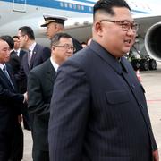 Kim Jong-Un landade med ett Air China-plan i Singapore under söndagen. 