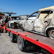 Brända bilar som bärgats från det våldsamma upploppet på Rosengård, 2023.