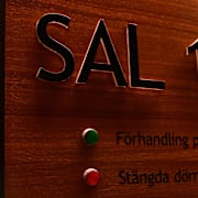 Rättegången äger rum i Attunda tingsrätt.