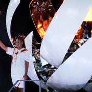 Naomi Osaka efter att ha tänt den olympiska elden på arenan vid öppningen