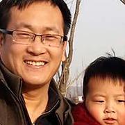 Wang Quanzhang med sin fru Li Wenzu och deras son.