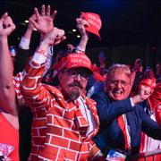 Supporters cheer as Republican presidential nominee former President Donald Trump arrives at an election night watch party at the Palm Beach Convention Center, Wednesday, Nov. 6, 2024, in West Palm Beach, Fla.
