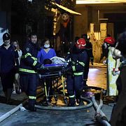 Räddningsarbetare i Hanoi. Pham Trung Kien / AP