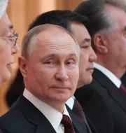 Putin under annandagen.  Alexey Danichev / AP