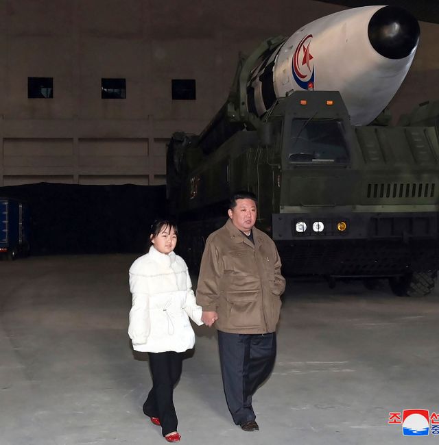 This photo provided on Nov. 19, 2022, by the North Korean government shows North Korean leader Kim Jong Un, right, and his daughter inspects a missile at Pyongyang International Airport in Pyongyang, North Korea, Friday, Nov. 18, 2022.  朝鮮通信社 / AP