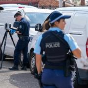 Polis utanför kyrkan efter dådet. 