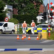 Polis och räddningspersonal på plats vid olyckan.