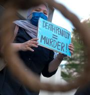 Demonstrant mot dödsstraff. Vincent Thian / AP
