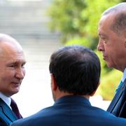 Russian President Vladimir Putin, left, and Turkish President Recep Tayyip Erdogan, right, talk to each other during their talks at Russia's Black Sea resort of Sochi, Russia, Monday, Sept. 4, 2023. (Mikhail Klimentyev, Sputnik, Kremlin Pool Photo via AP)  XAZ119