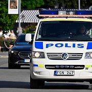 En bild på en poliseskort.