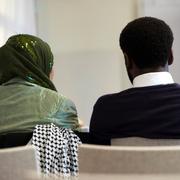 Arkivbild. Personer på ett möte med Sveriges Unga Muslimer. 