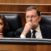 Regerings talesperson Soraya Saenz de Santamaria och Mariano Rajoy.