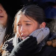 Sörjande i Crans-Montana, 4 januari. 