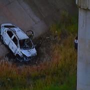 Bild från TV Globo News visar den utbrända bilen.