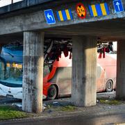 Två personer har förts till sjukhus efter att en dubbeldäckarbuss kört in i bro i Linköping.