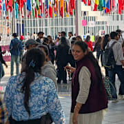 Mötesdeltagare anländer till mötet i New Delhi.